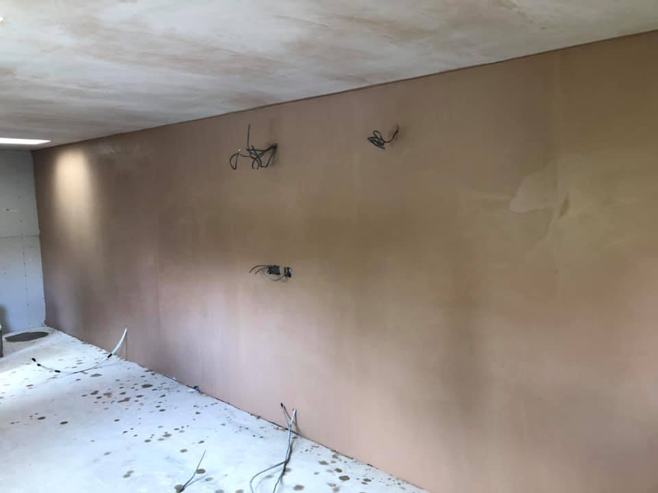 Office right side wall plastering and rendering.