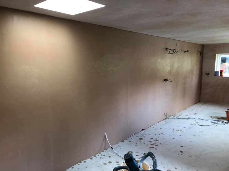 Office left side wall plastering and rendering.