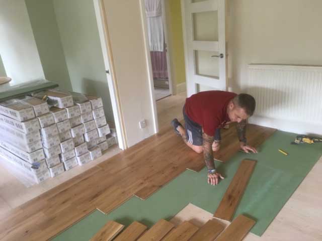 Wooden flooring being laid.