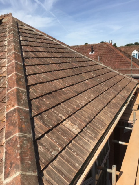 Repaired roofing tiles from the left.
