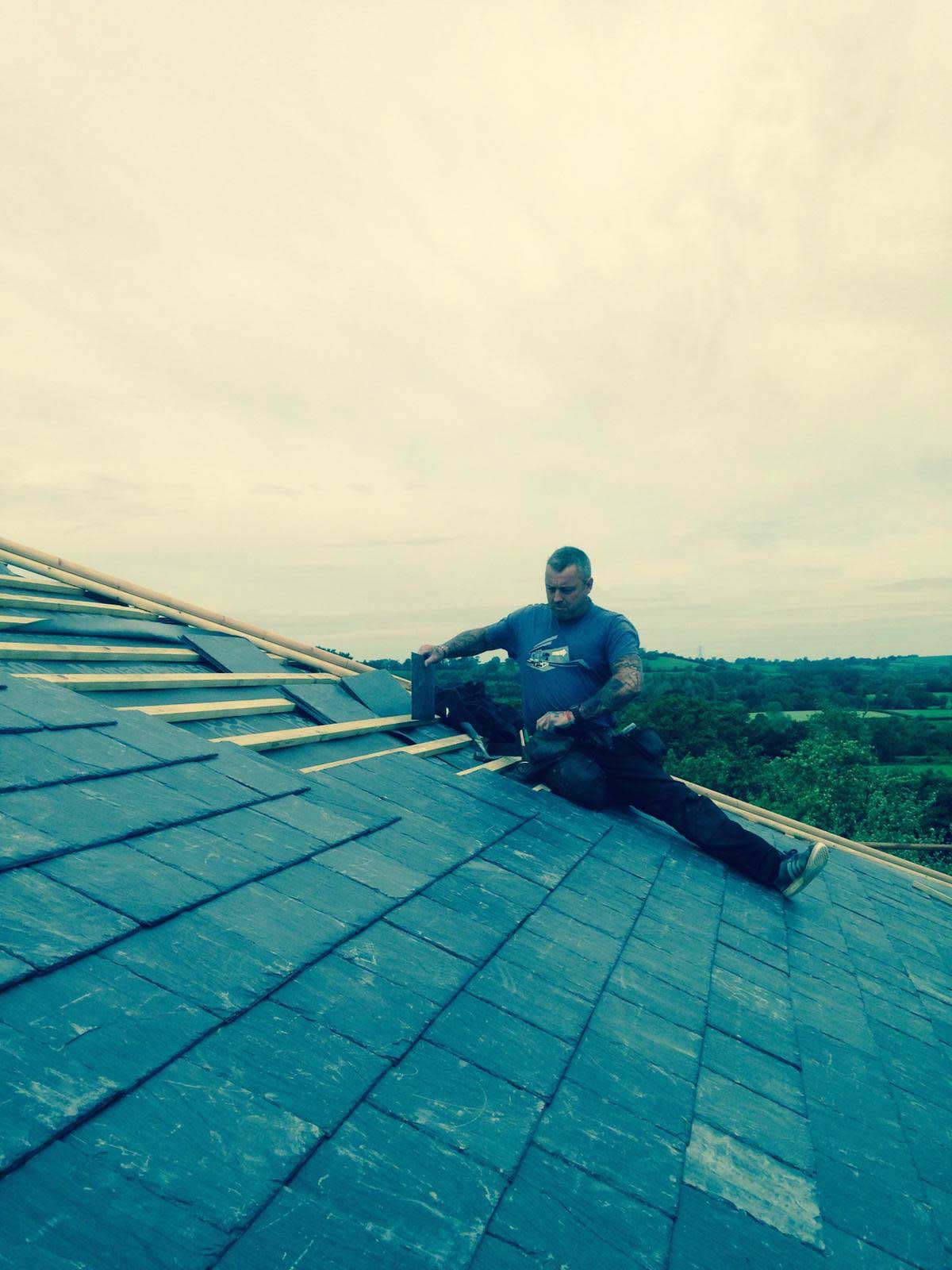 Man working on a roof repair.